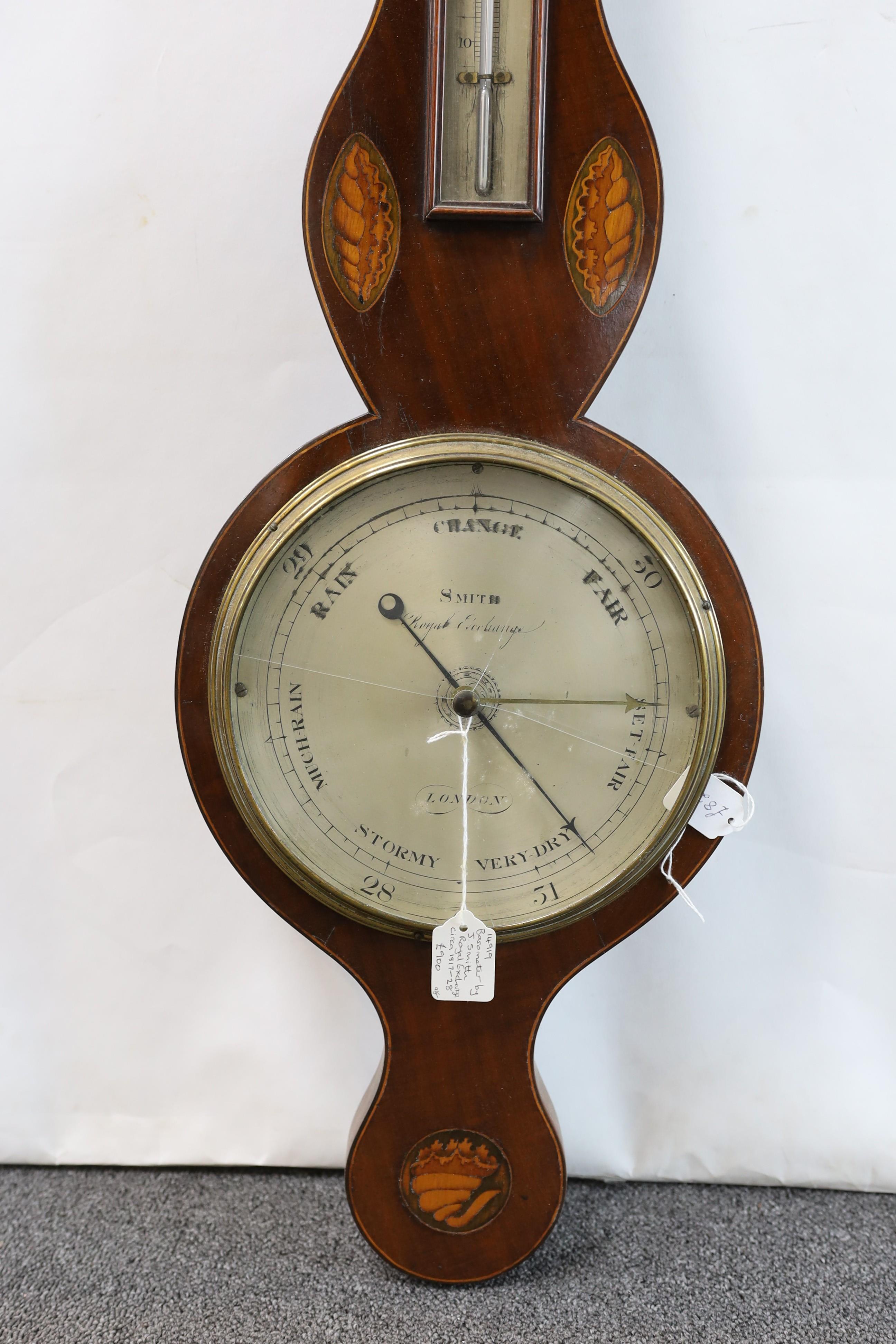 A George III inlaid mahogany wheel barometer and thermometer, the silvered dial marked Smith, Royal Exchange, London, height 98cm